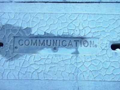 word-recessed-into-concrete-communication